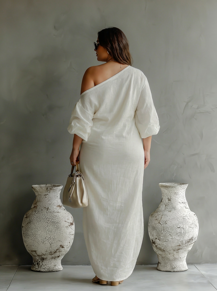 Elegantti Valuva Mekko Ivory Valkoisena Olkapäiltä